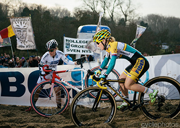 Two people on a cyclocross track.